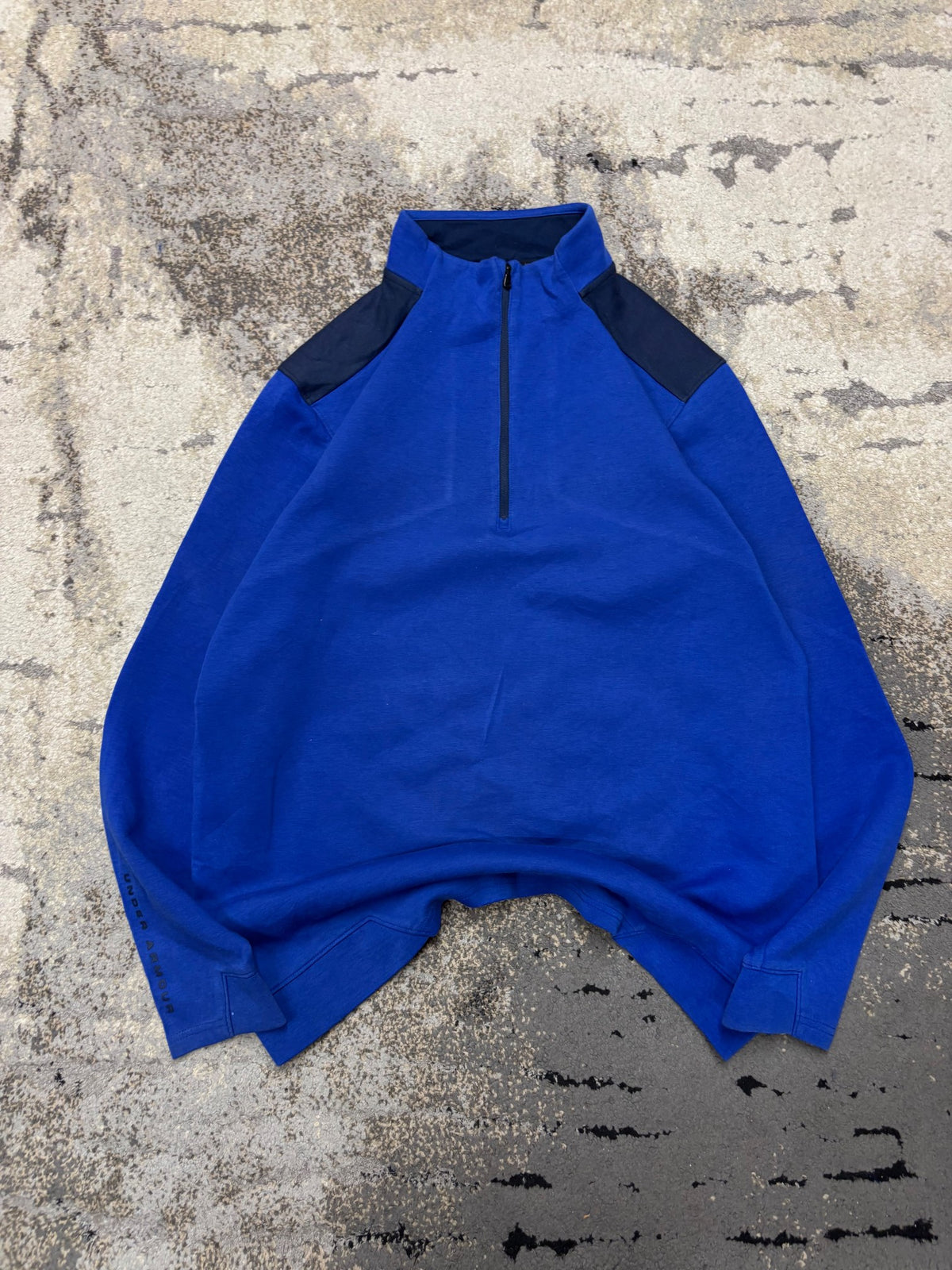 Bluza Under Armour zipp, męskie w bardzo dobrym stanie rozmiar L, widok z góry
